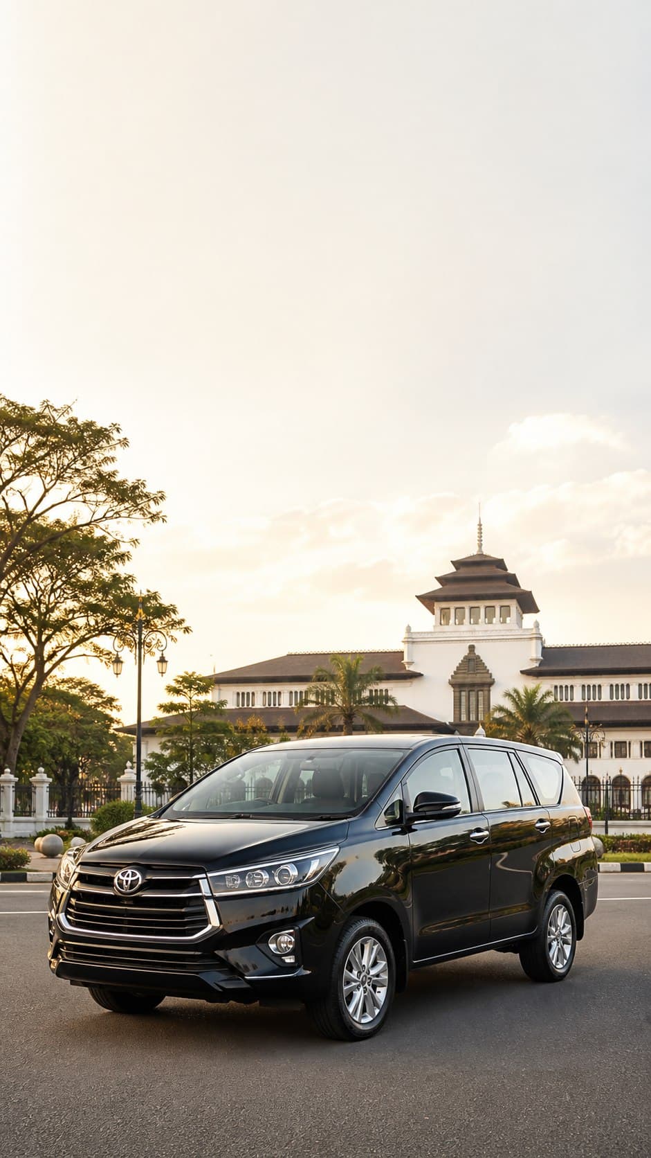 Toyota Innova hitam dengan suasana Bandung untuk rental mobil